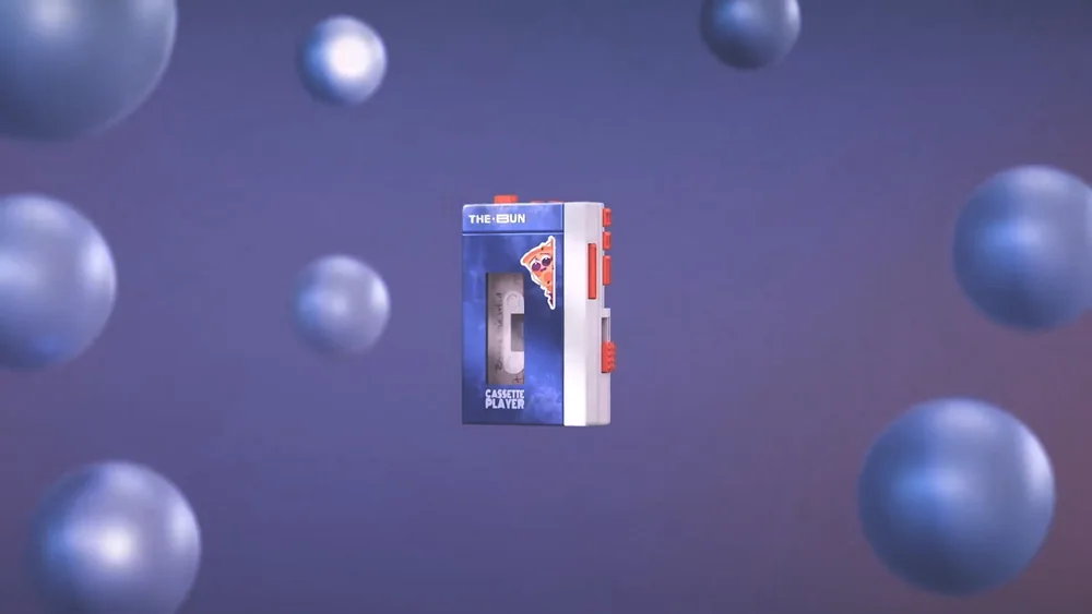 A branded cassette player floating among spheres. 3D modelling, lookdev and lighting.